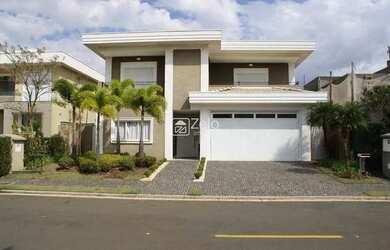 Imagem: A casa possui 5 Dormitórios, 5 Banheiros, 4 Vagas na garagem