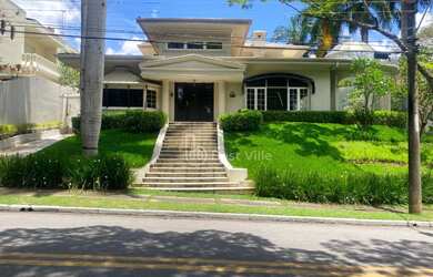 Imagem: A casa em condomínio possui 4 Dormitórios, 5 Banheiros, 5