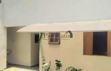 Imagem: A casa possui 4 Dormitórios, 5 Banheiros, 4 Vagas na garagem