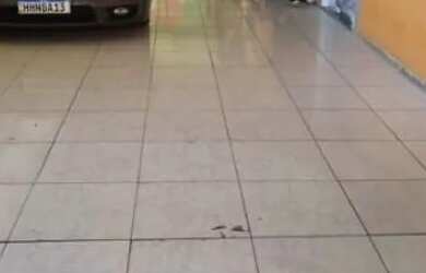 Imagem: A casa possui 3 Dormitórios, 2 Banheiros, 4 Vagas na garagem