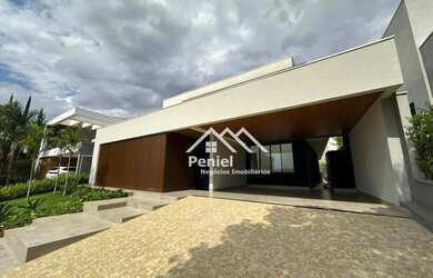 Imagem: A casa em condomínio à venda possui 4 Dormitórios, 5 Banheiros