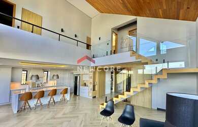 Imagem: A casa em condomínio possui 4 Dormitórios, 5 Banheiros, 4