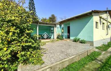 Imagem: A casa possui 2 Dormitórios, 2 Banheiros, 5 Vagas na garagem