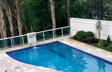 Imagem: A casa em condomínio possui 4 Dormitórios, 5 Banheiros, 5