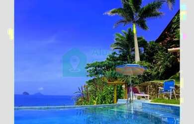 Imagem: A casa possui 5 Dormitórios, 5 Banheiros, 3 Vagas na garagem