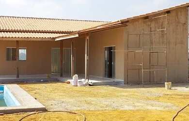 Imagem: A casa possui 2 Dormitórios, 2 Banheiros, 3 Vagas na garagem