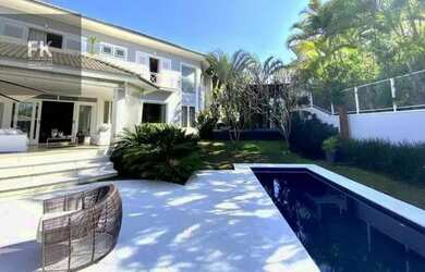 Imagem: A casa em condomínio à venda possui 4 Dormitórios, 5 Banheiros