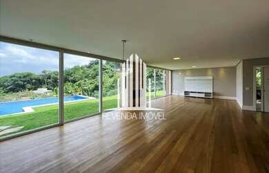 Imagem: A casa em condomínio à venda possui 4 Dormitórios, 5 Banheiros