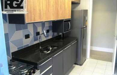 Imagem: O apartamento possui 2 Dormitórios, 1 Banheiro, 1 Vaga na garagem