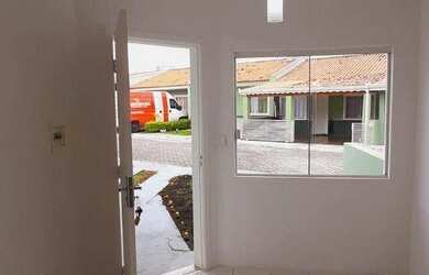 Imagem: A casa possui 2 Dormitórios, 1 Banheiro, 1 Vaga na garagem