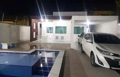 Imagem: A casa possui 4 Dormitórios, 5 Banheiros e 3 Vagas na garagem