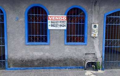 Imagem: A casa possui 3 Dormitórios, 2 Banheiros, 2 Vagas na garagem