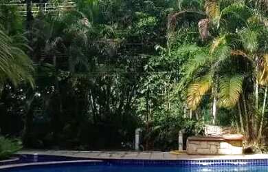 Imagem: A casa possui 5 Dormitórios, 5 Banheiros, 5 Vagas na garagem