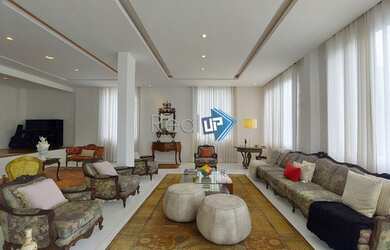 Imagem: A casa possui 5 Dormitórios, 5 Banheiros, 4 Vagas na garagem