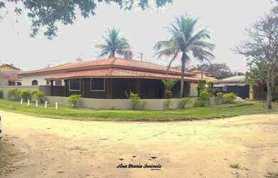 Imagem: A casa possui 5 Dormitórios, 5 Banheiros, 4 Vagas na garagem