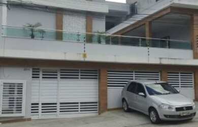 Imagem: A casa possui 2 Dormitórios, 1 Banheiro, 1 Vaga na garagem