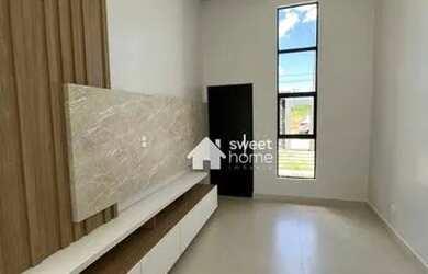 Imagem: A casa possui 3 Dormitórios, 2 Banheiros, 2 Vagas na garagem