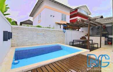 Imagem: A casa em condomínio à venda possui 4 Dormitórios, 3 Banheiros