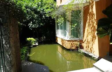 Imagem: A casa em condomínio possui 5 Dormitórios, 1 Banheiro, 5 Vagas