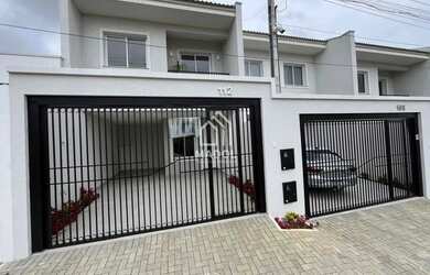 Imagem: A casa possui 3 Dormitórios, 3 Banheiros, 2 Vagas na garagem