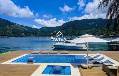 Imagem 5: Deslumbrante residência costeira no renomado Condomínio Portogalo, em...