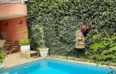 Imagem: A casa possui 4 Dormitórios, 5 Banheiros, 5 Vagas na garagem