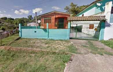 Imagem: A casa possui 2 Dormitórios, 2 Banheiros, 2 Vagas na garagem