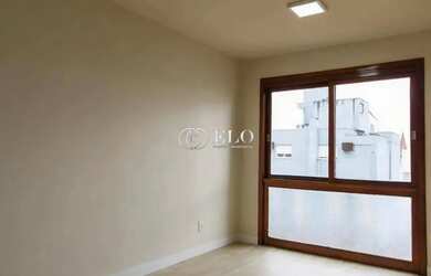 Imagem: O apartamento possui 1 Dormitório, 1 Banheiro, 1 Vaga na garagem