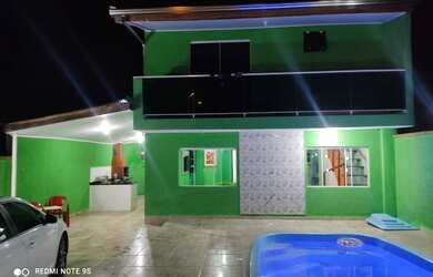 Imagem: A casa possui 4 Dormitórios, 2 Banheiros, 2 Vagas na garagem