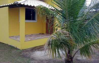 Imagem: A casa possui 2 Dormitórios e 5 Vagas na garagem e está localizado