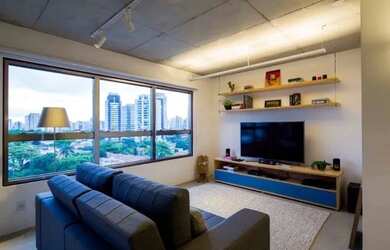 Imagem: O apartamento possui 1 Dormitório, 3 Banheiros, 2 Vagas na