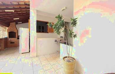 Imagem: A casa possui 4 Dormitórios, 5 Banheiros, 5 Vagas na garagem