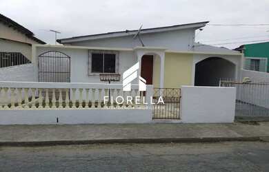 Imagem: A casa à venda possui 3 Dormitórios, 1 Banheiro, 1 Vaga na