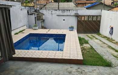 Imagem: A casa possui 2 Dormitórios, 1 Banheiro, 1 Vaga na garagem