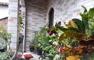 Imagem: A casa possui 2 Dormitórios, 1 Banheiro, 1 Vaga na garagem