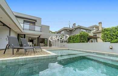 Imagem: A casa em condomínio possui 4 Dormitórios, 5 Banheiros, 4