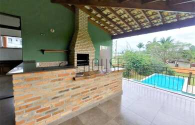 Imagem: A casa em condomínio possui 3 Dormitórios, 5 Banheiros, 371m²