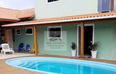 Imagem: A casa à venda possui 3 Dormitórios, 2 Banheiros e 3 Vagas