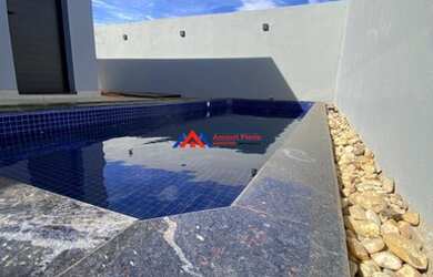 Imagem: A casa em condomínio possui 3 Dormitórios, 4 Banheiros, 4