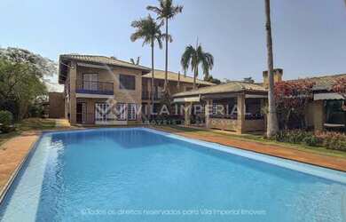 Imagem: A casa em condomínio à venda possui 5 Dormitórios, 5 Banheiros