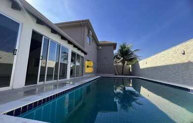 Imagem: A casa em condomínio possui 4 Dormitórios, 5 Banheiros, 4