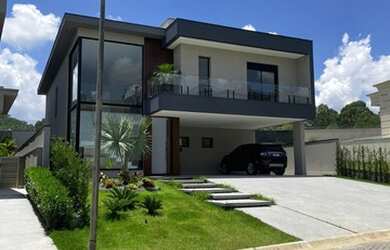 Imagem: A casa em condomínio possui 5 Dormitórios, 5 Banheiros, 3