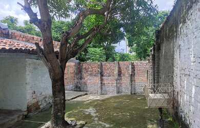 Imagem: A casa possui 3 Dormitórios, 3 Banheiros, 2 Vagas na garagem