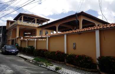 Imagem: A casa possui 4 Dormitórios, 4 Banheiros, 4 Vagas na garagem