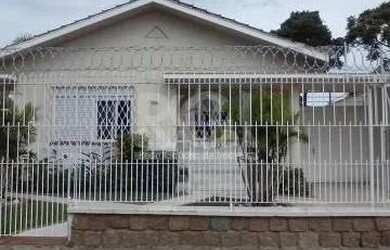 Imagem: A casa possui 3 Dormitórios, 4 Banheiros, 4 Vagas na garagem