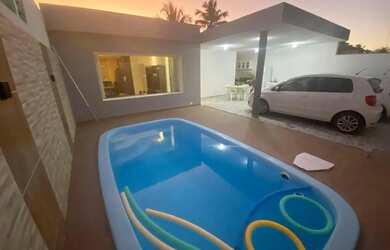 Imagem: A casa possui 3 Dormitórios, 2 Banheiros, 2 Vagas na garagem