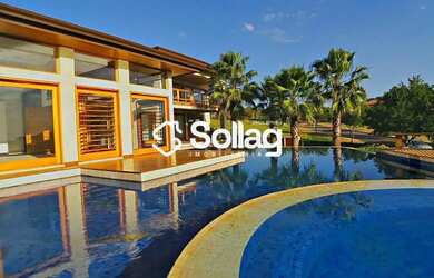 Imagem: A casa em condomínio possui 5 Dormitórios, 5 Banheiros, 5