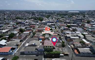 Imagem 12: Casa de Esquina no Dom Pedro 1 - Casa de esquina com um prédio