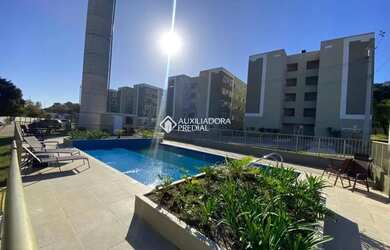 Imagem: O apartamento possui 2 Dormitórios, 1 Banheiro, 1 Vaga na garagem