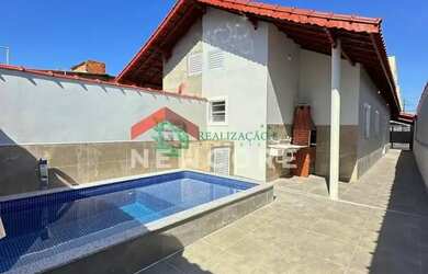 Imagem: A casa possui 2 Dormitórios, 1 Banheiro, 2 Vagas na garagem